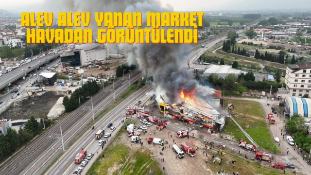 Alev alev yanan market havadan görüntülendi