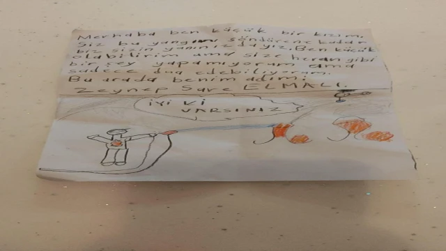 Ödemiş'teki yangın bölgesinde kız çocuğundan itfaiye ekibini duygulandıran not